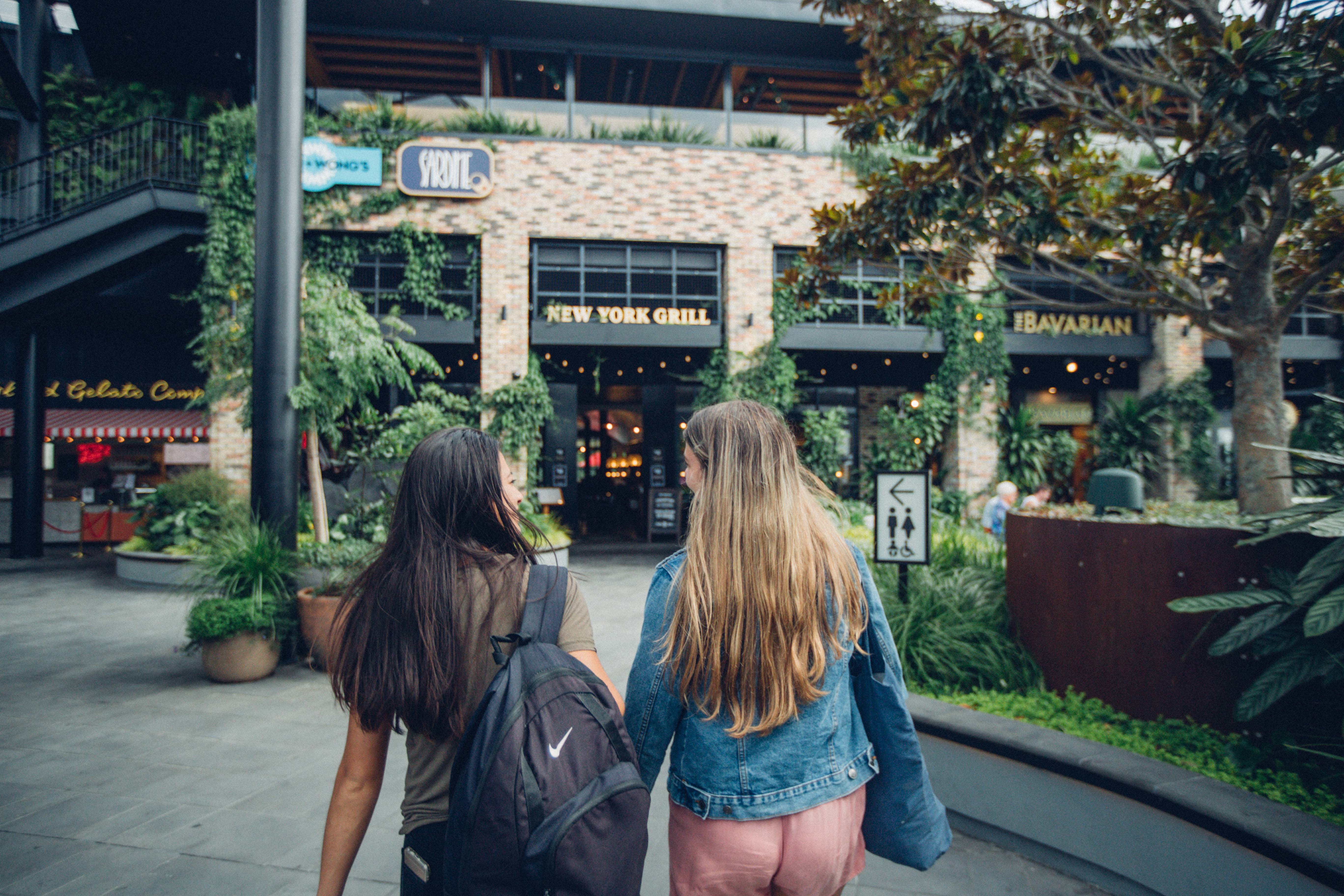 Two-girls-walking-and-interacting-with-each-other-Newmarket.jpg Two-girls-walking-and-interacting-with-each-other-Newmarket.jpg