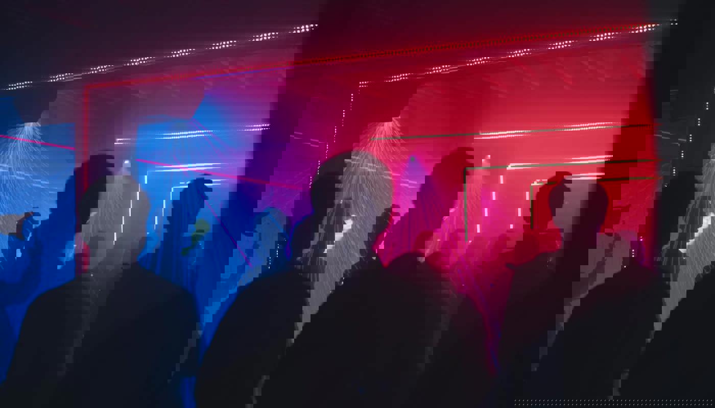 People under the Neon lights at Darklight