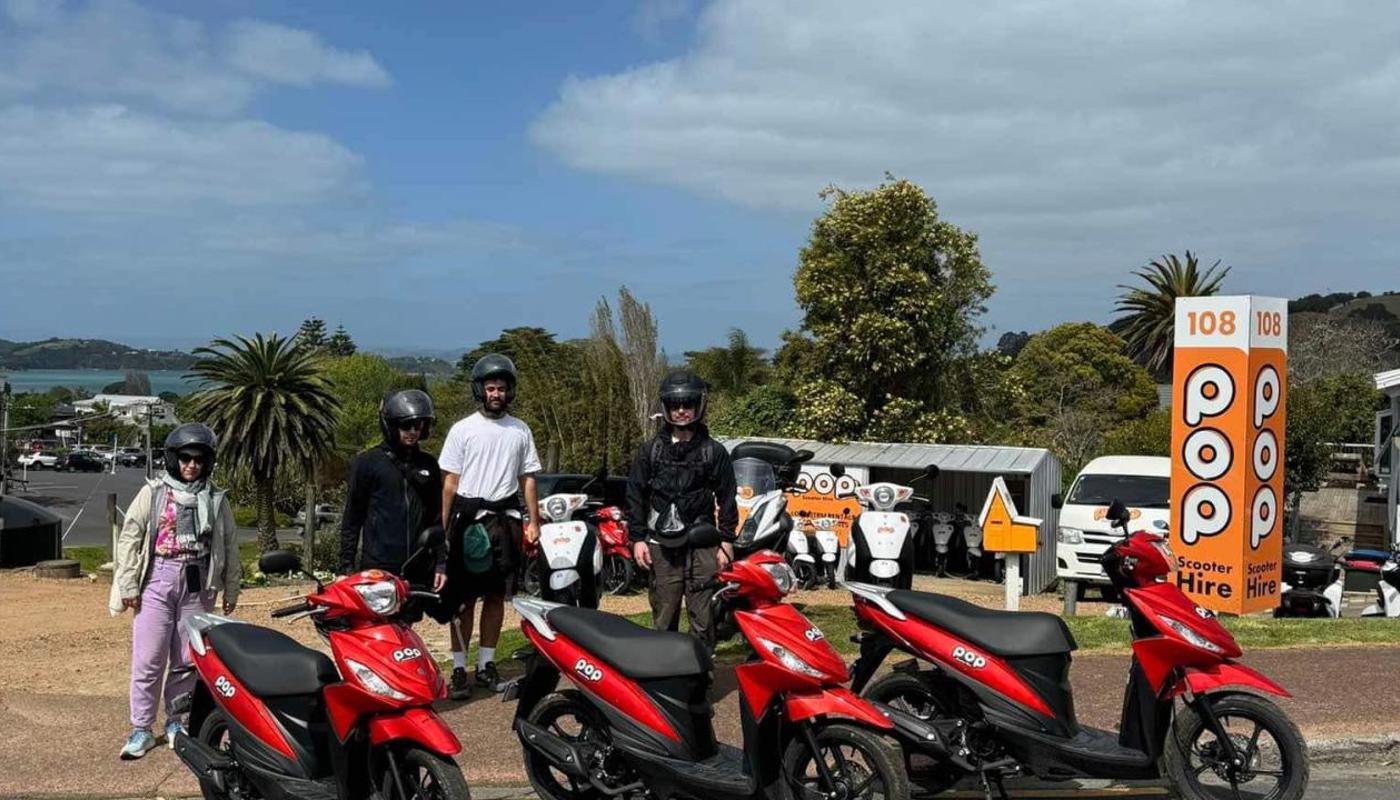 A small group renting three of our Suzuki Address 110 scooters.