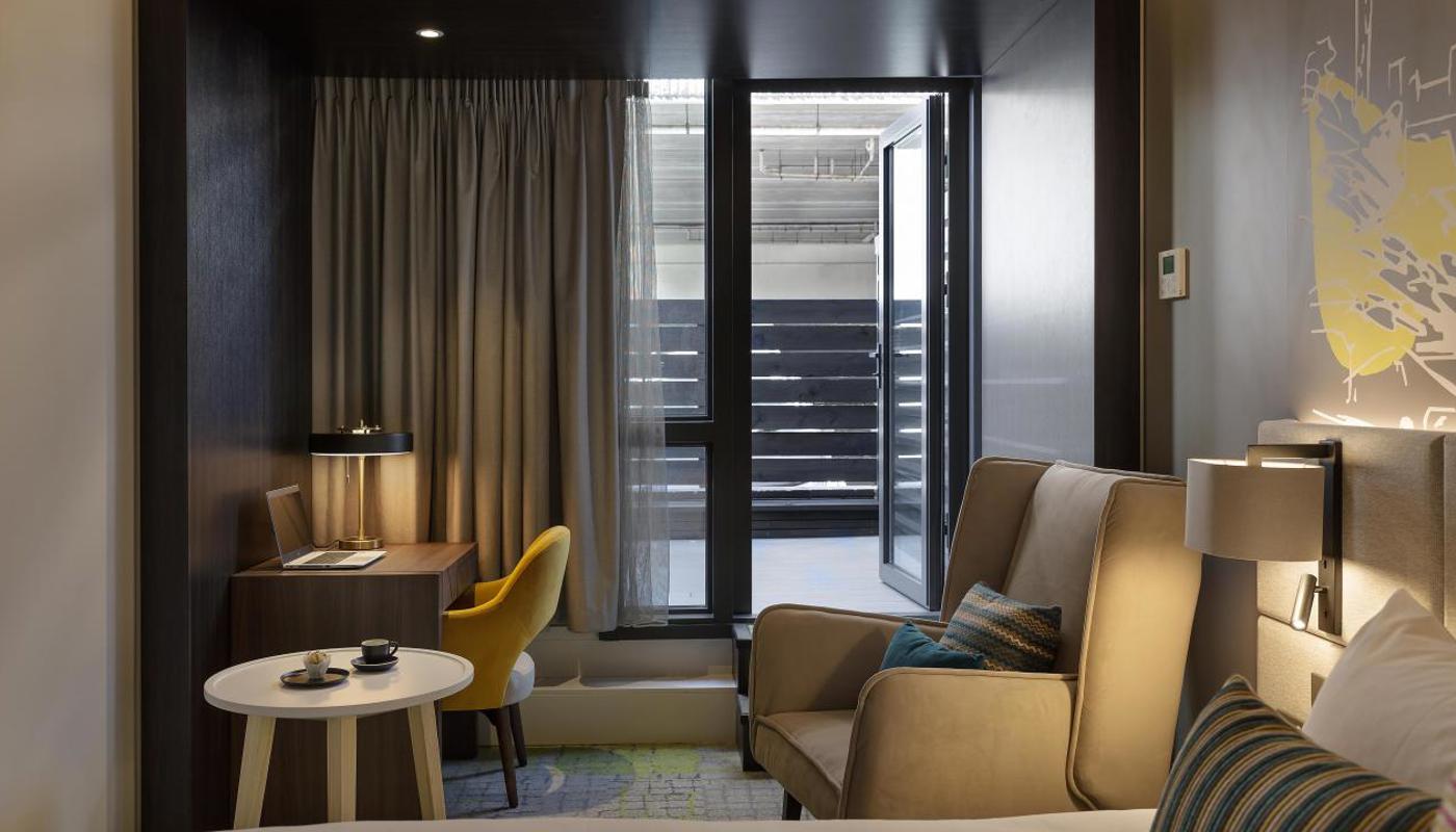 Lounge furniture, work desk and some rooms feature balconies